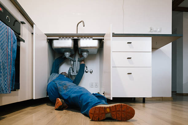 Professional Emergency Plumber technician working in Milford, DE